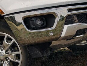 HIGH-STRENGTH STEEL FRAME AND FRAME-MOUNTED STEEL BUMPERS