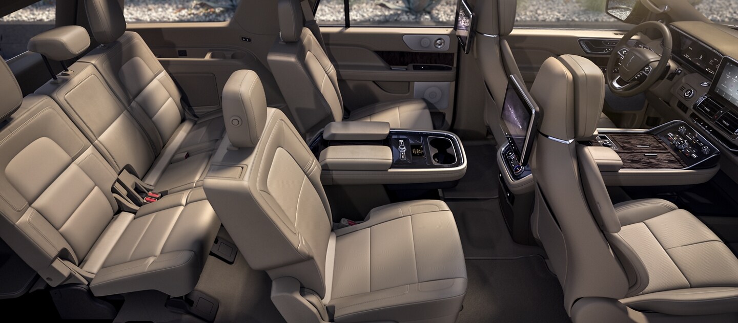2022 Lincoln Navigator vs 2022 Acura MDX 2021 Lincoln Navigator interior in tan leather color.
