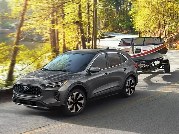 2025 Ford Escape towing a boat