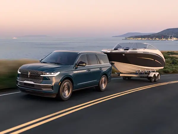 2025 Lincoln Navigator towing a boat