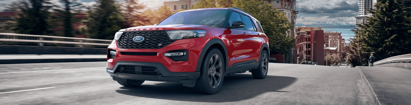 red Ford Explorer driving in Harrisburg IL