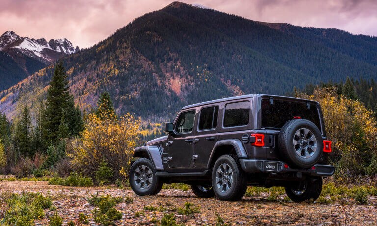 2021 Jeep Wrangler facing a mountain