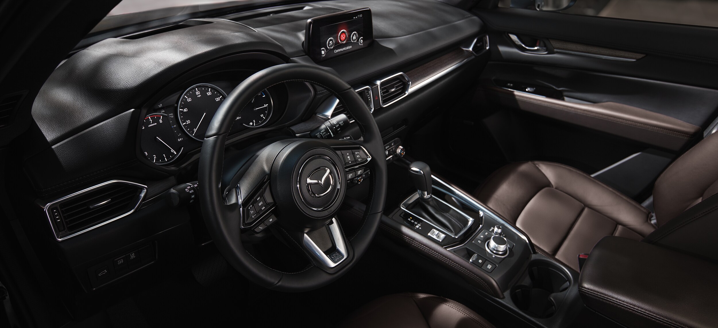 Mazda of New Bern is a car dealership near Pine Knoll Shores NC | 2020 Mazda vehicle black leather interior