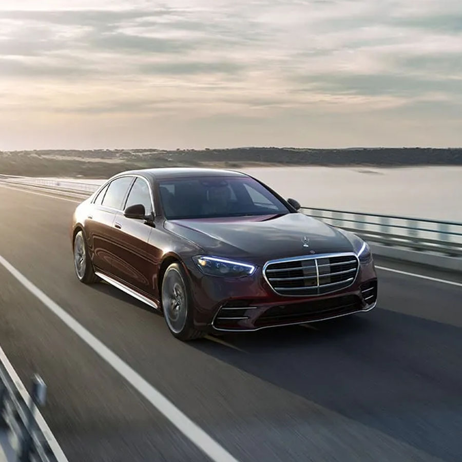 S 580 4MATIC in Rubellite Red with AMG Line and 20-inch AMG multispoke wheels