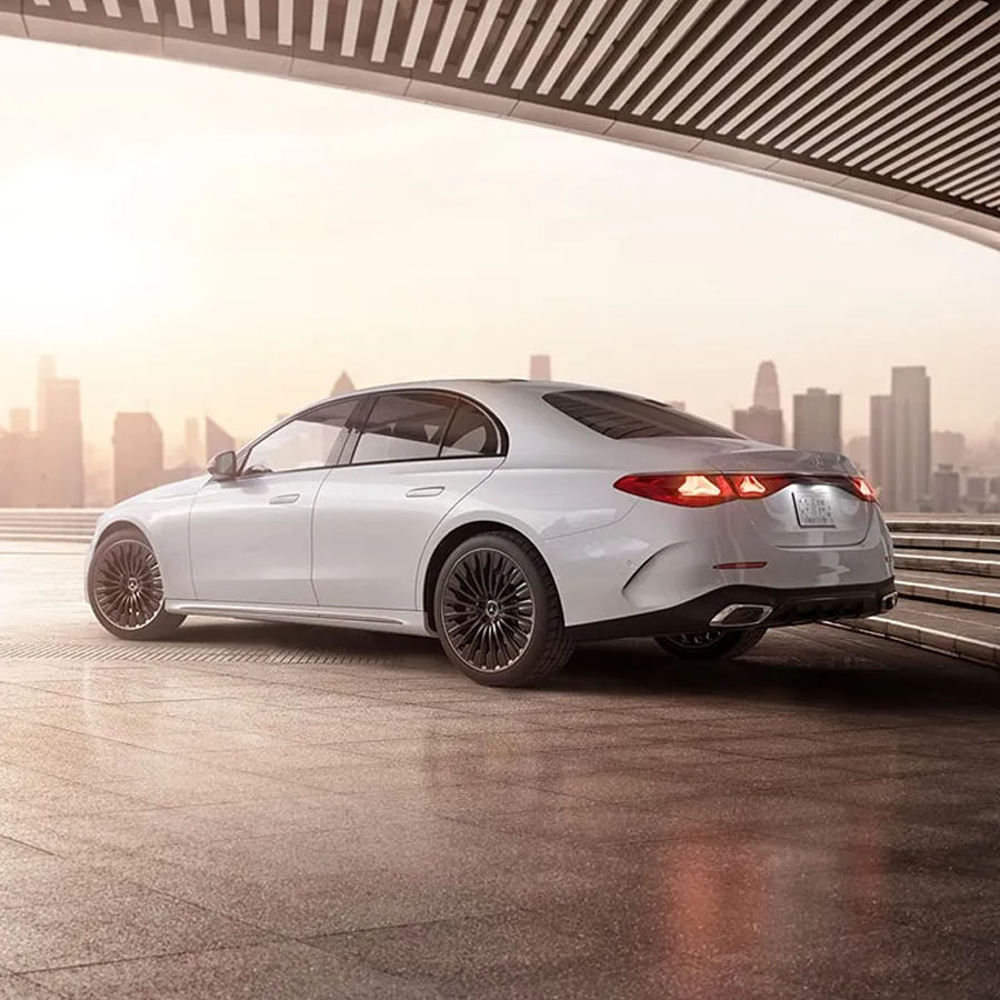 E 350 4MATIC in Polar White with black 20-inch AMG multispoke wheels