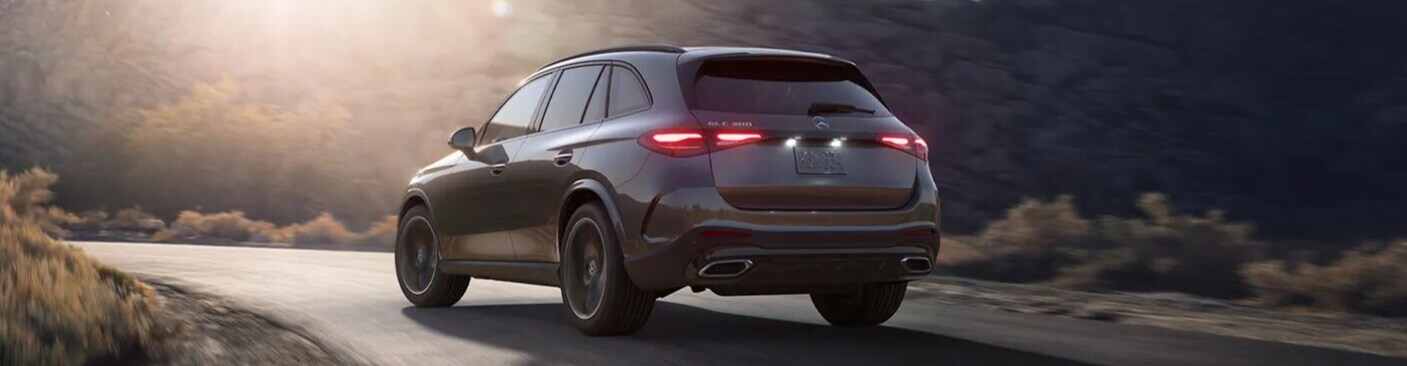 mercedes-benz-glc-300-accessories.png Rear photo of the 2024 Mercedes-Benz GLC 300 driving down a road