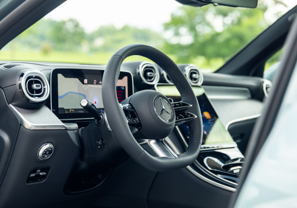 mercedes-benz-glc-350-interior.png Mercedes-Benz GLC 350 interior. There is a map pulled up on the dash behind the steering wheel