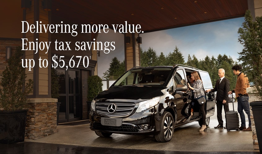 Hotel  guests entering Mercedes-Benz hotel shuttle van in front of hotel.