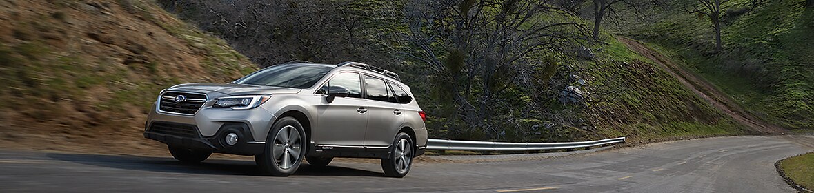 2019-Subaru-Outback-2.5iLimited-SUV-L03.jpg Subaru Outback cruising the back roads