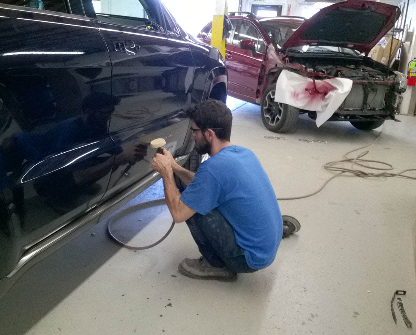 Justin-Sanding-Down-Body-Work.jpg