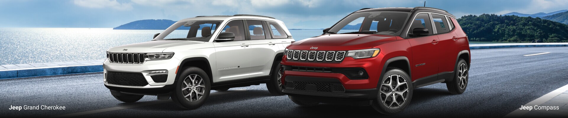 2025 Jeep Grand Cherokee Limited 4x4 in Bright White alongside a 2025 Jeep Compass Limited 4x4 in Red Hot Pearl Coat