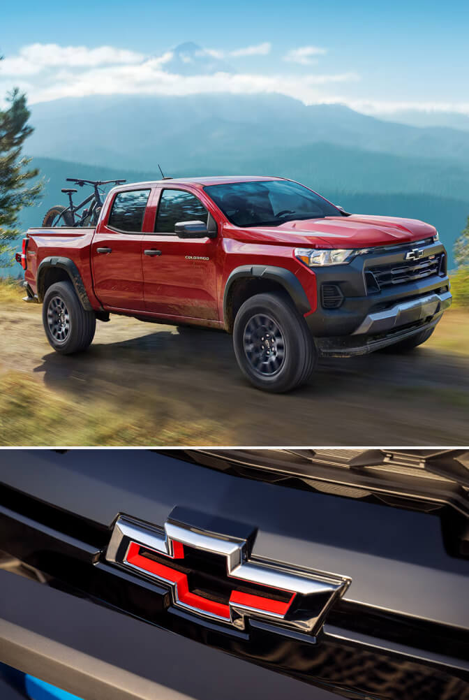 2025 Chevrolet Colorado Trail Boss 4WD in Radiant Red parked on a cliff with a close-up image of the Chevy Logo in red on the grill