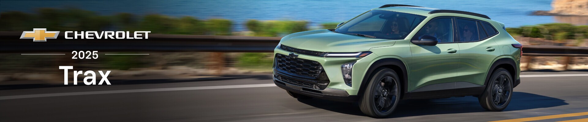 2024 Chevrolet Trax ACTIV in Cacti Green driving around a highway bend with the ocean in the background