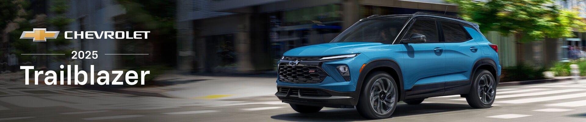 New 2025 Chevrolet Trailblazer RS in Marina Blue Metallic driving in a city