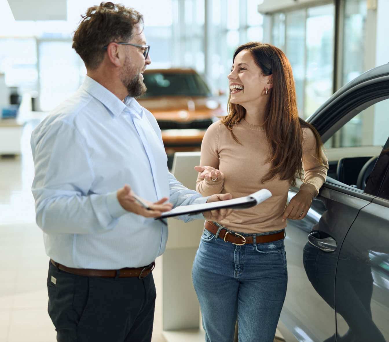 Client and customer having a conversation in a Hyundai Dealership