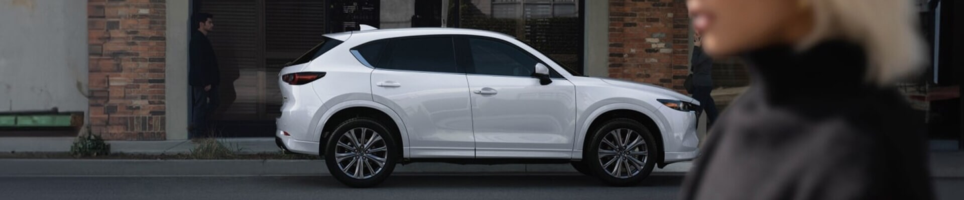 2025 Mazda CX-5 in White parked on the street