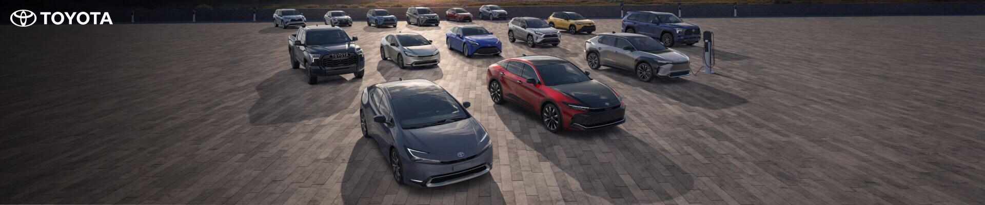 2026 Toyota Lineup parked in front of a sunset