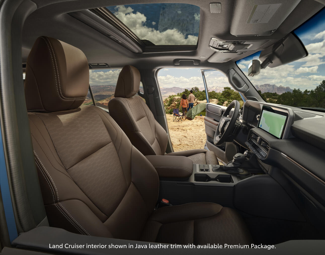 Interior cabin view of a Toyota Land Cruiser with brown Java leather seats and an open sunroof.