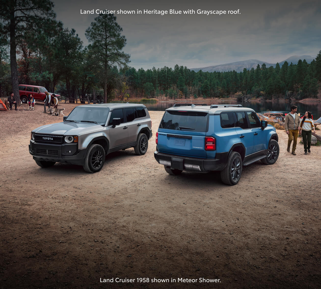 Rear and front three-quarter views of two Toyota Land Cruisers parked by a scenic lake.