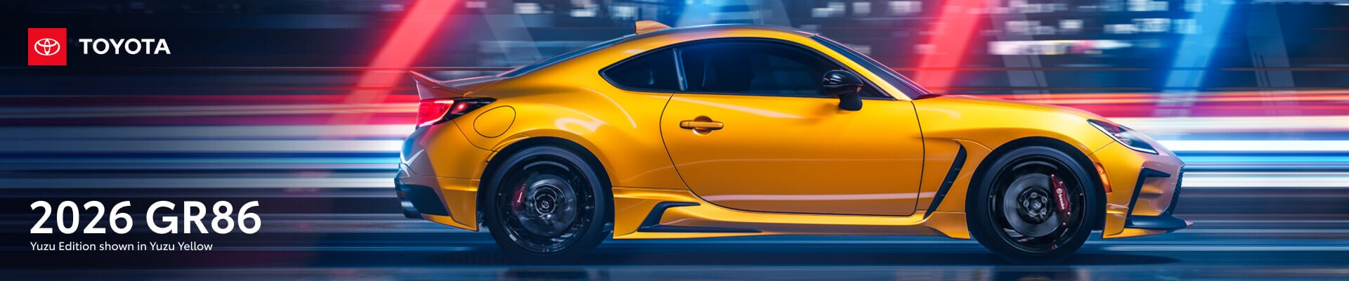 2026 Toyota GR86 Yuzu Edition in Yuzu Yellow in front of a city backdrop