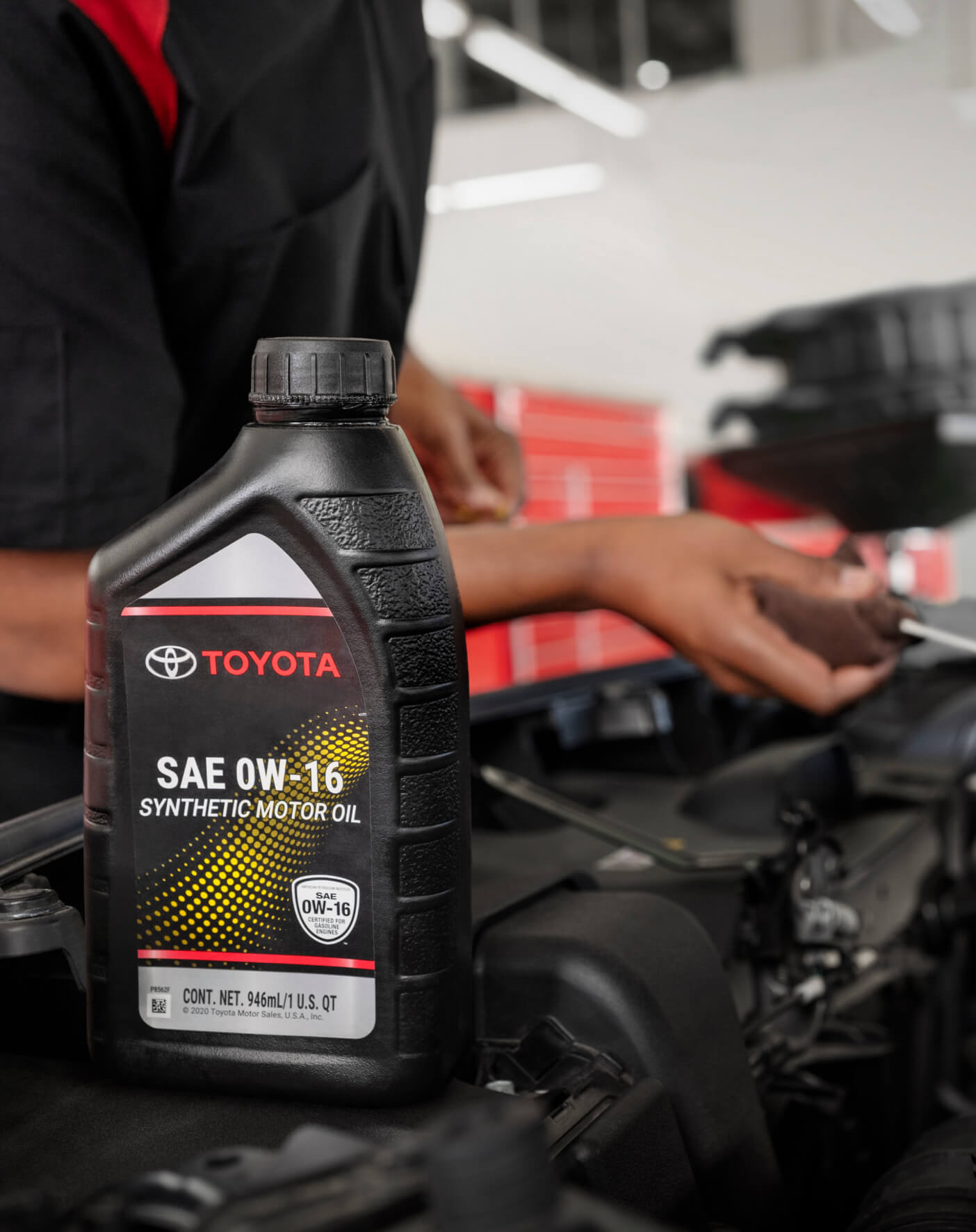 Close-up of Toyota SAE OW-16 Synthetic Motor Oil being used at the Toyota Service Department within McGee Toyota of Putnam