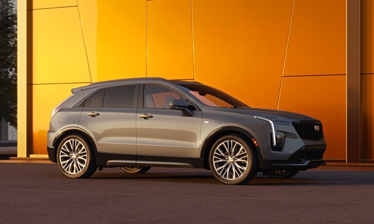 2025 Cadillac XT4 Exterior Side Parked By Orange Wall
