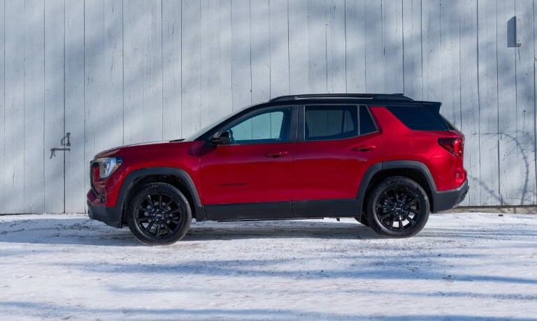 2025 GMC Terrain Exterior Side View Near Snowy Barn