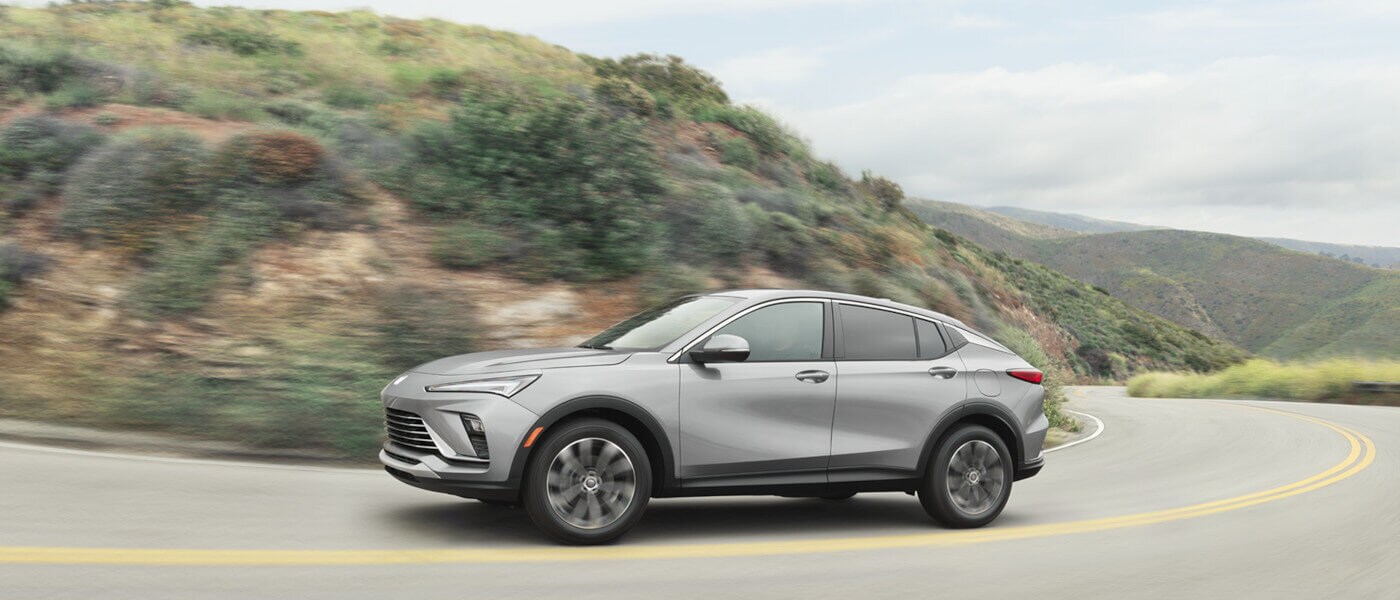 2026 Buick Envista Exterior Driving On Curved Mountain Road