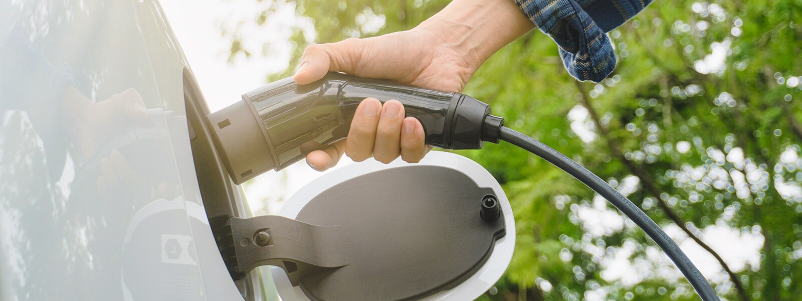 electric-car-or-ev-is-charging-at-station-2024-10-18-06-42-03-utc.jpg