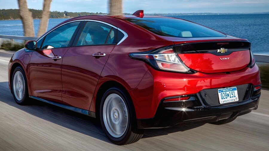 Red Chevy Volt gloss black accents driving nest to water