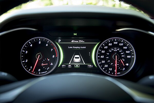 Lane Keeping Assist saftey feature displayed in the gauge cluster