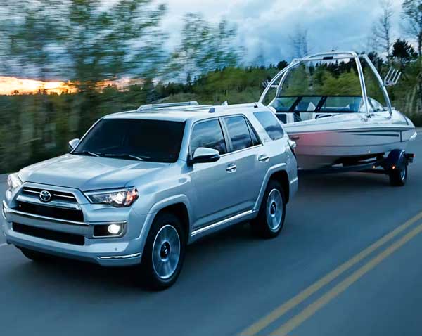 toyota 4Runner driving through forest