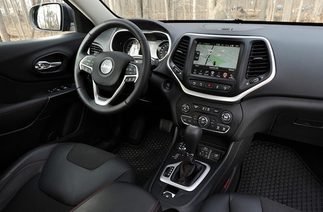 Red 2016 Jeep Cherokee interior dashboard Image