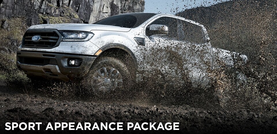 2019 Magnetic Ford Ranger Sport Appearance Package driving through mud