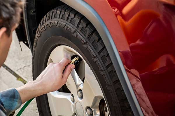 checking tire pressure