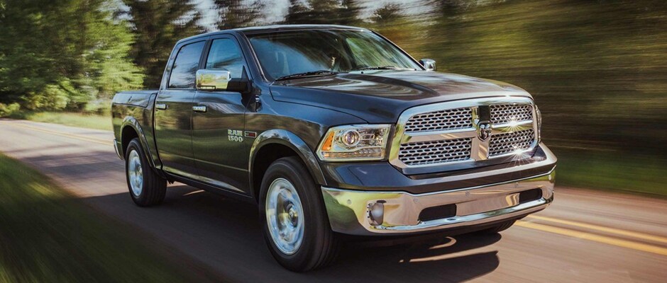 Ram 1500 driving down the road