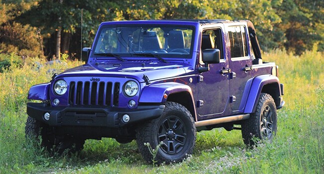 2016 Jeep Wrangler Unlimited in an open field