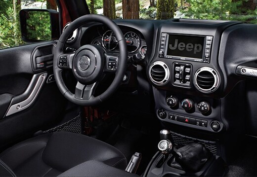 Enjoy the latest technology and stylish interior design of the 2017 Jeep Wrangler Unlimited! 2017 Jeep Wrangler Unlimited interior dash