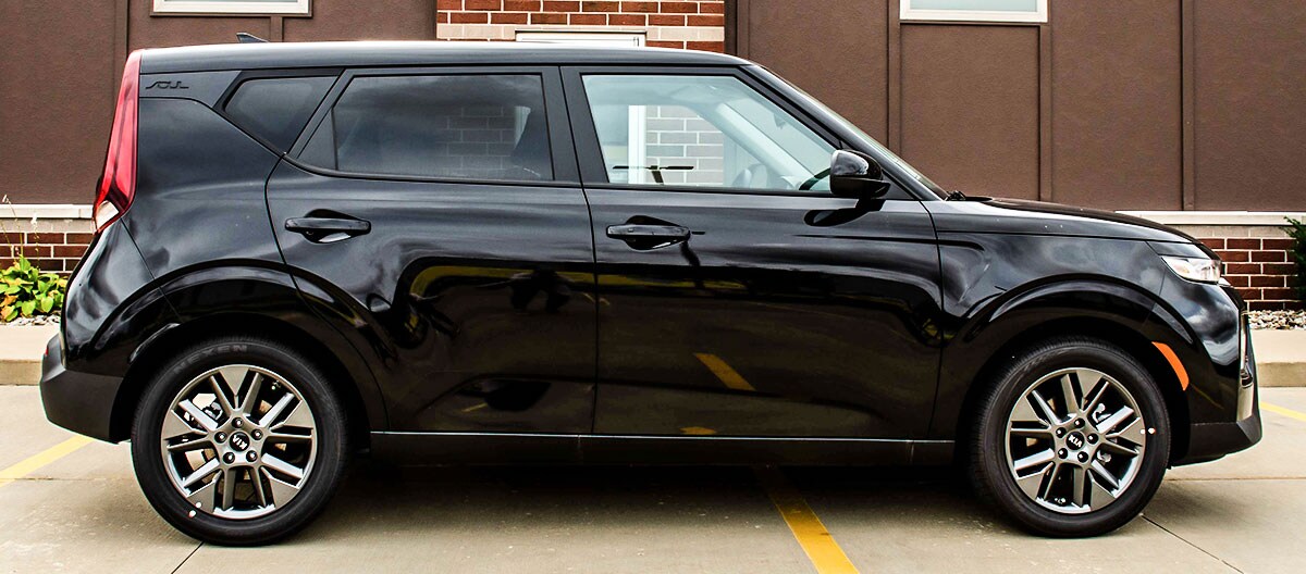 2021 Kia Soul parked outside next to building