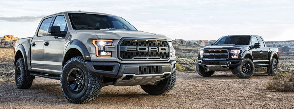 Silver and black Ford Raptors