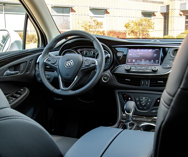2019 Buick Envision front cabin area and leather seating infotainment center