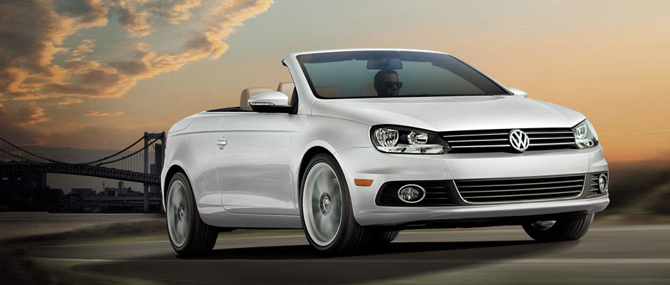 Volkswagen EOS driving down the street