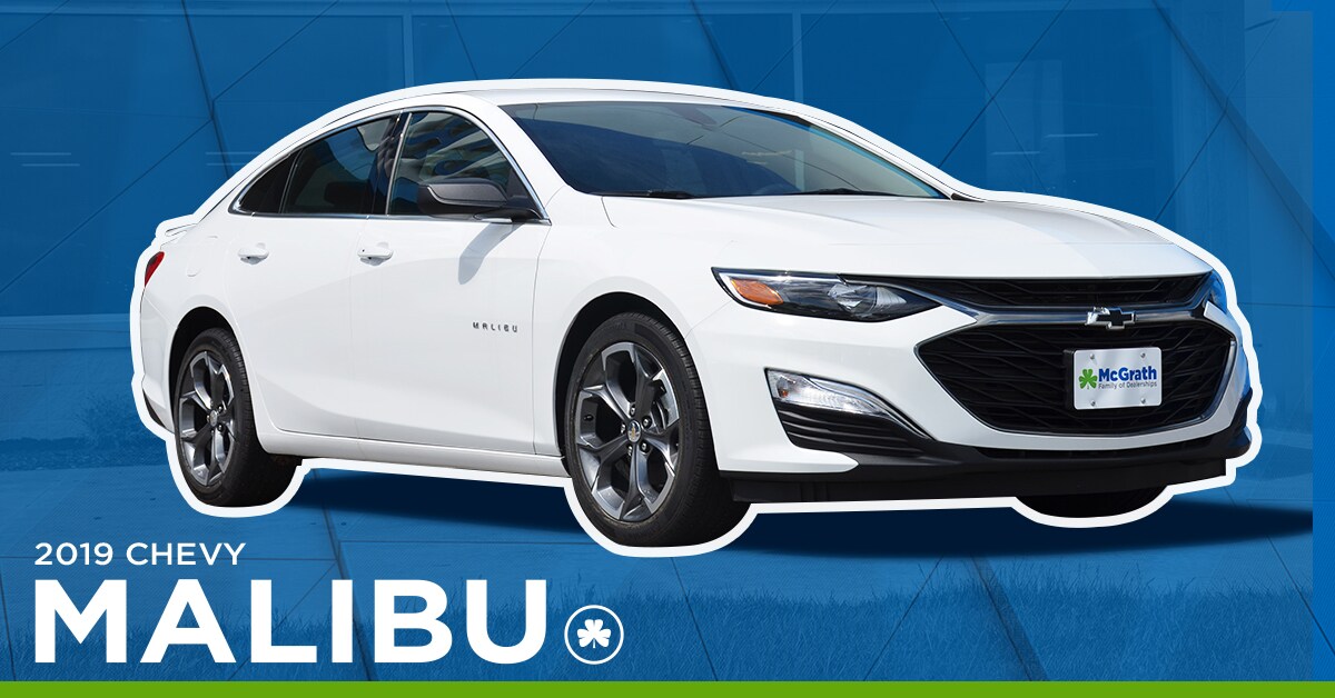 2019 white Chevy Malibu parked
