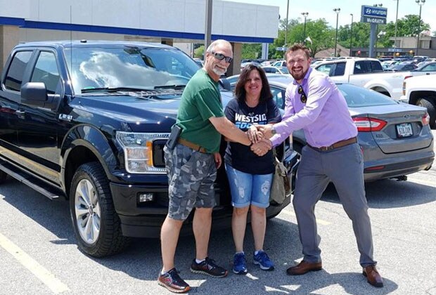 Happy customers at McGrath Ford