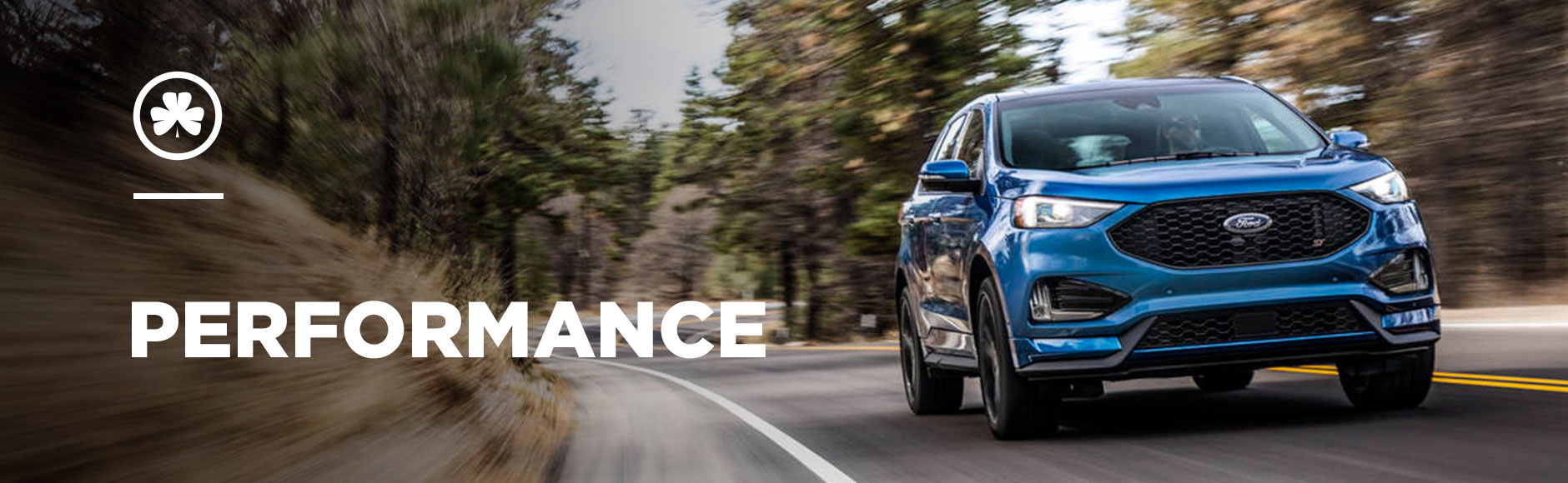 The 2019 Ford Edge ST performance model Ford Edge ST cruising down a winding country road