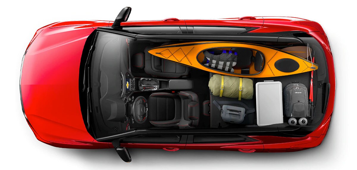 2021 Chevy Trailblazer cargo management system with a kayak and camping materials in the rear of the vehicle using the folding seats