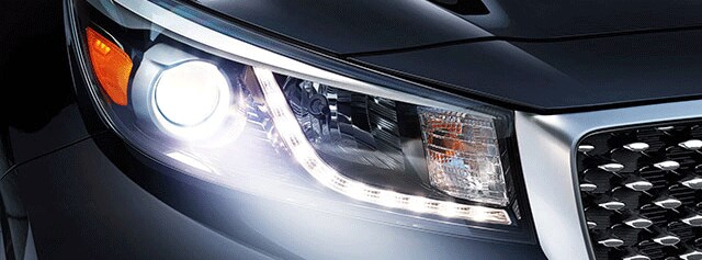 Blue Kia Sedona LED headlights