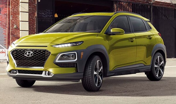 2019 Sunset Orange Hyundai Kona Limited Parked