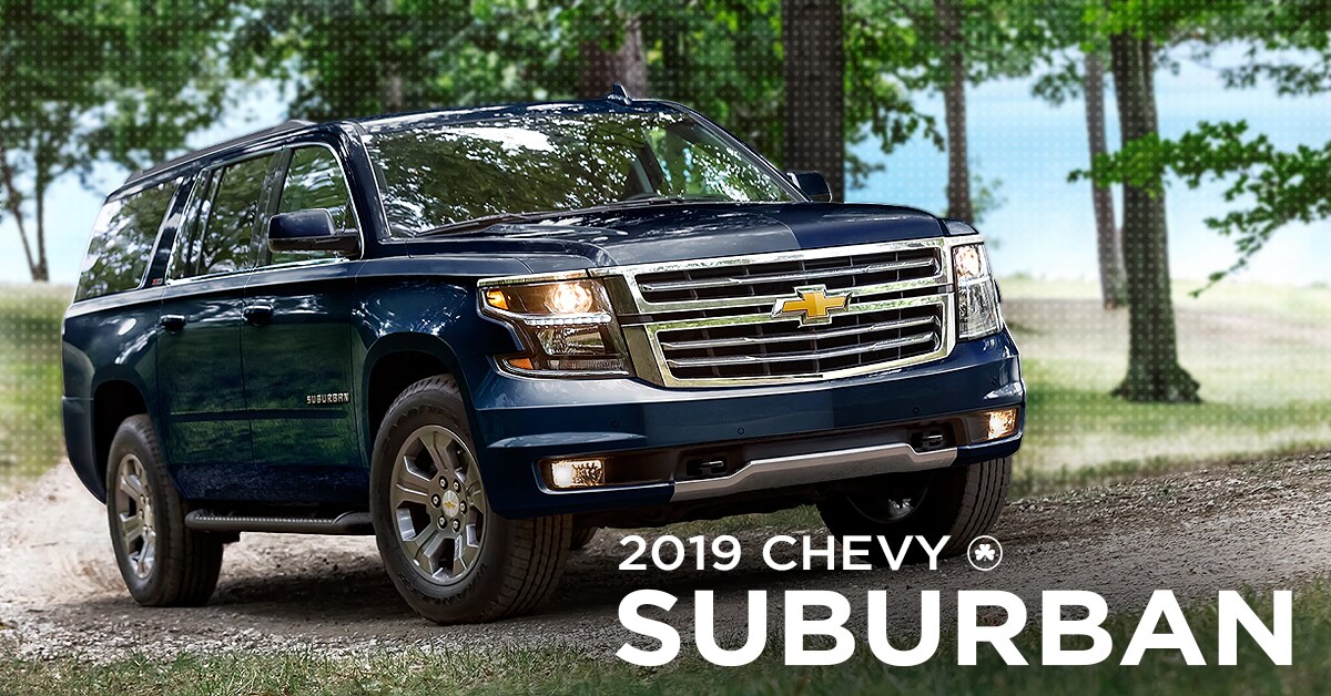 2019 Chevy Suburban Parked in the woods on gravel road