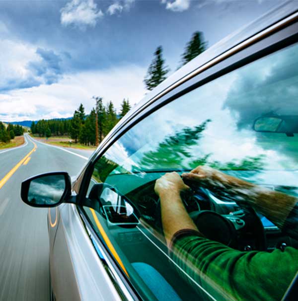 car driving down the road